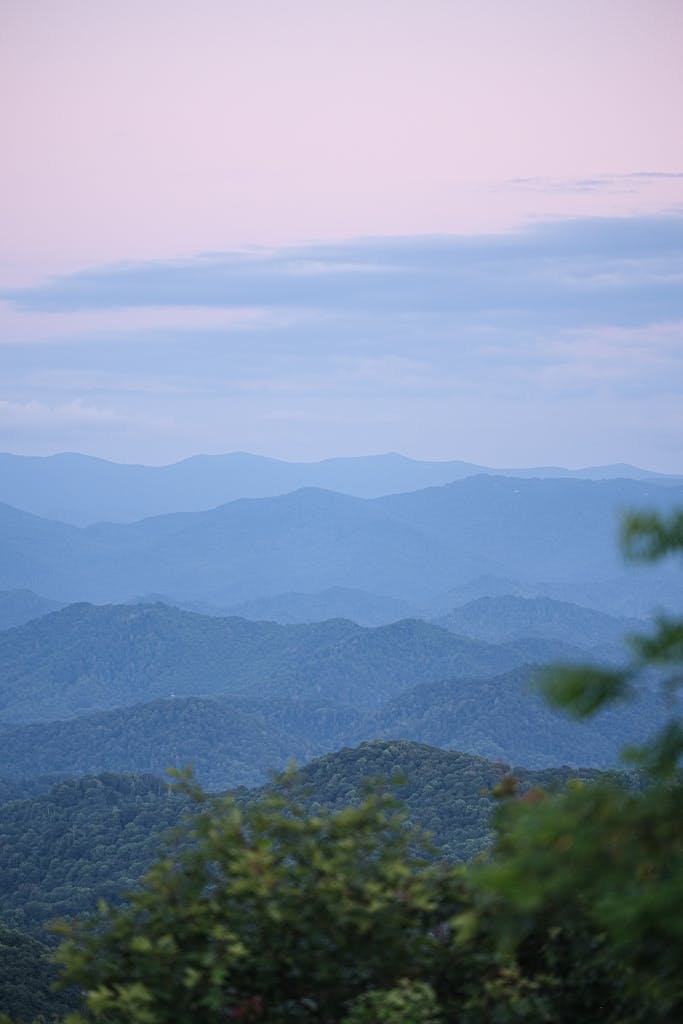 Experience the tranquil beauty of the Blue Ridge Mountains in North Carolina, captured during a serene evening.